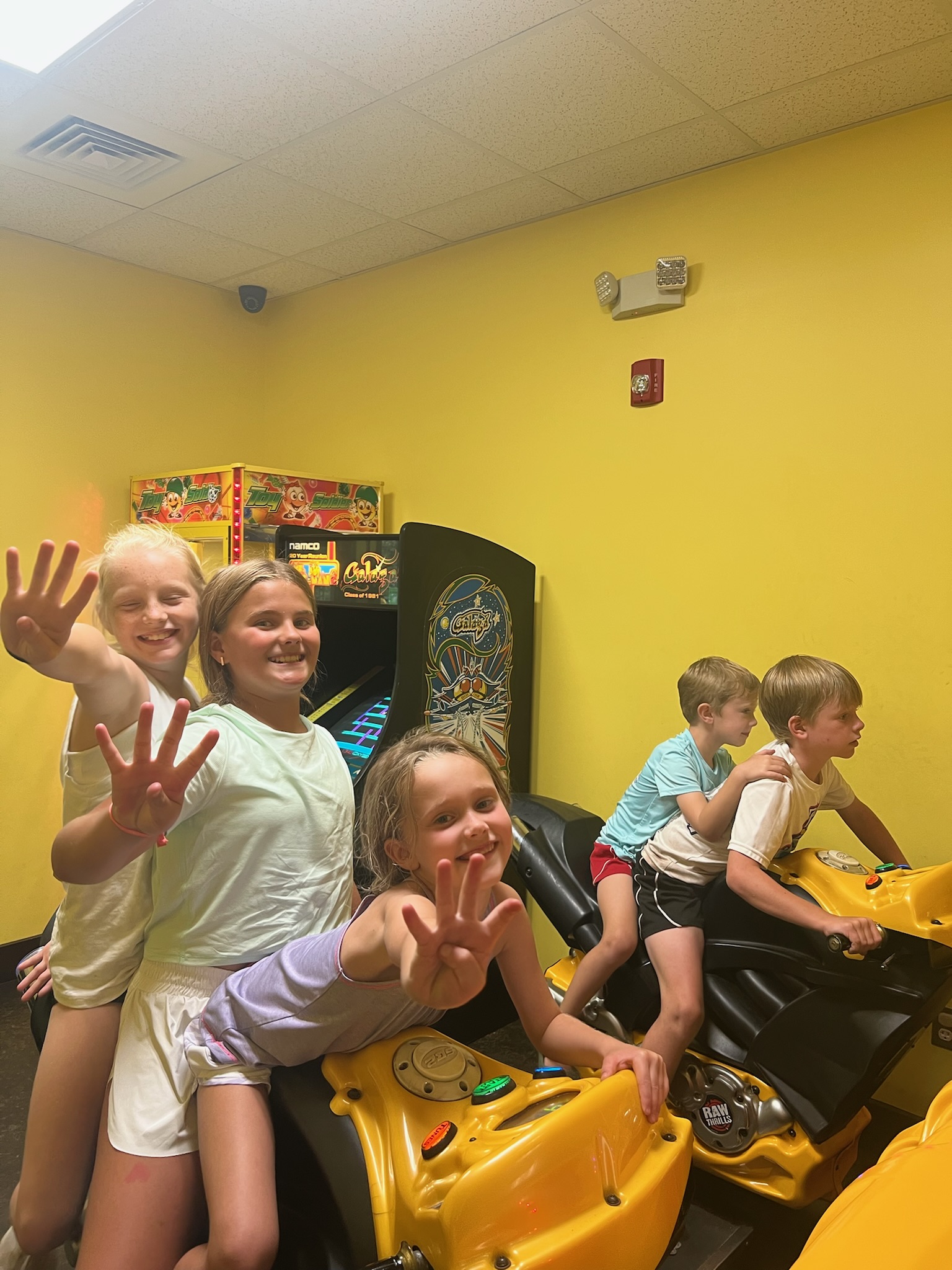 Kids in the arcade at Pirate's Cove
