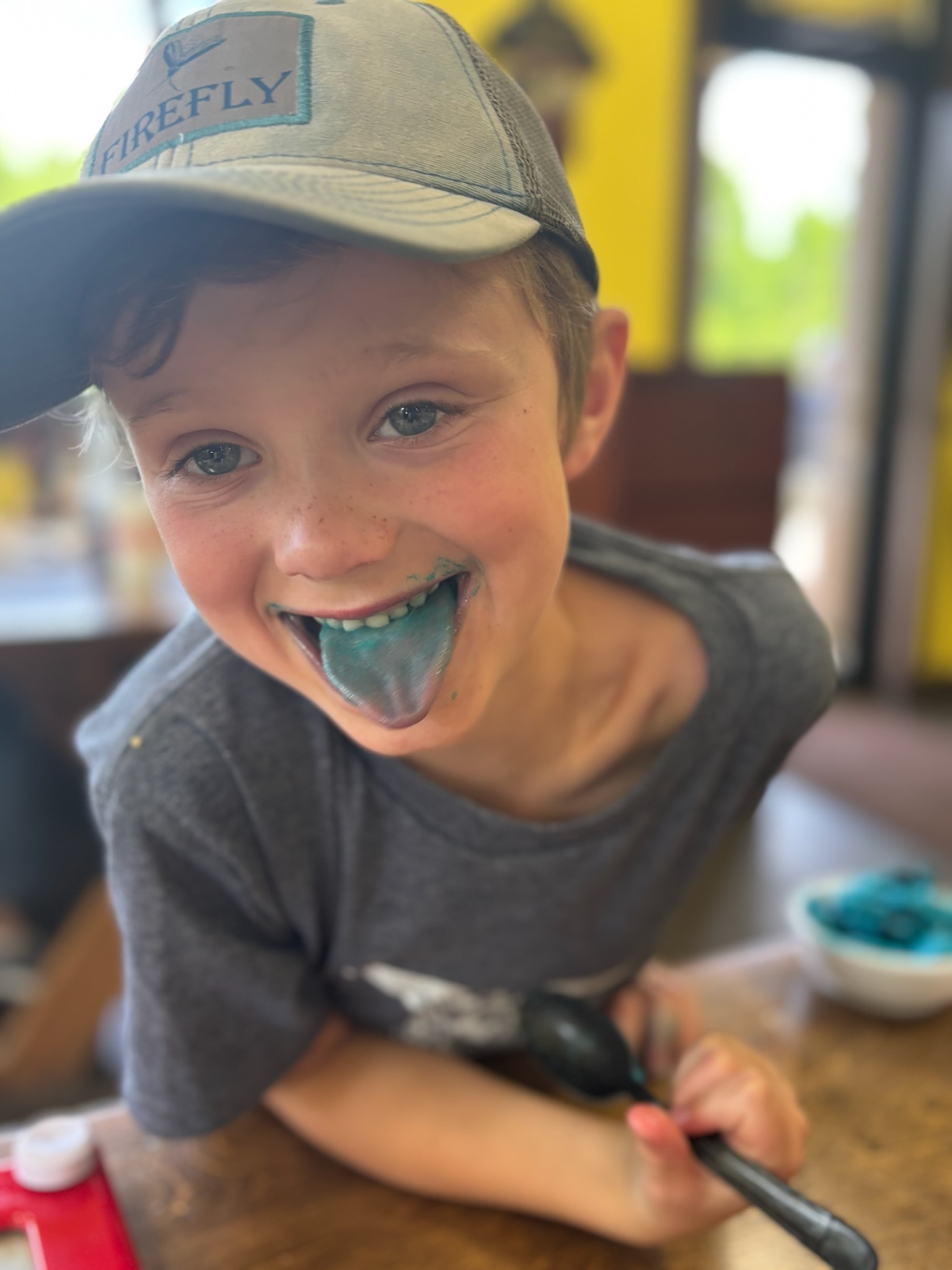 A happy kid after Blue Bell ice cream at Pirate's Cove
